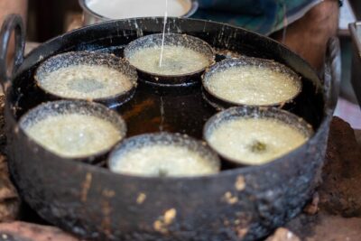 Food Walking Tour in Jaipur - Golcha Cinema: samosa first, then chai, butter, and a temple detour