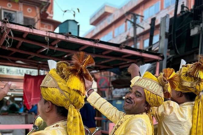 Jaipur Heritage Evening Walk - The Twilight Magic of Pink City - Kishanpole Bazar Road lights at dusk: temples, windows, and a photographer’s advantage