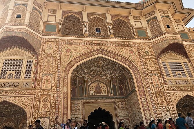 Jaipur Local Sightseeing Tour by Car and Driver - Amber Fort: red sandstone, hilltop views, and a Hindu-Muslim blend