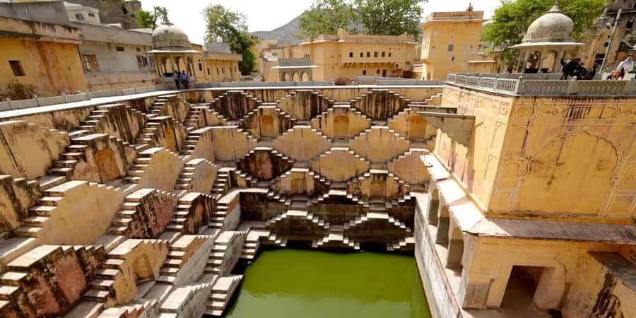 Jaipur: Private Full-Day Sightseeing Tour by Tuk-Tuk - City Palace complex: royalty architecture, plus real-world meaning